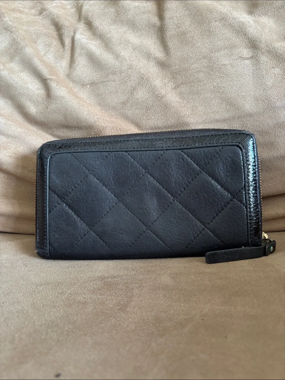 kate spade Black Quilted Zip-Around Wallet with Gold Plate